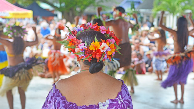 Cook Island dancers with woman in foreground