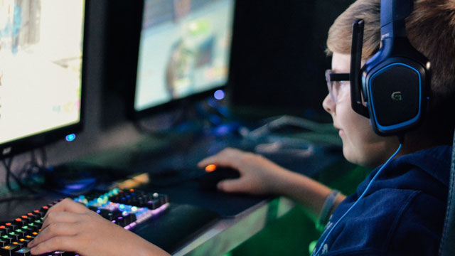 child playing computer game