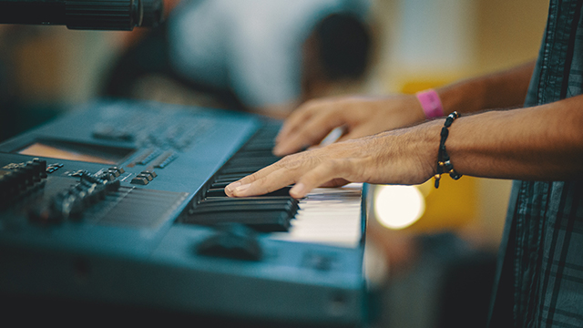 person playing keyboard
