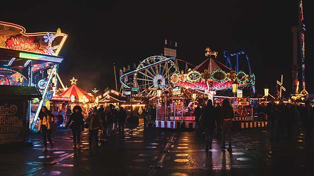 Theme park lit up at night