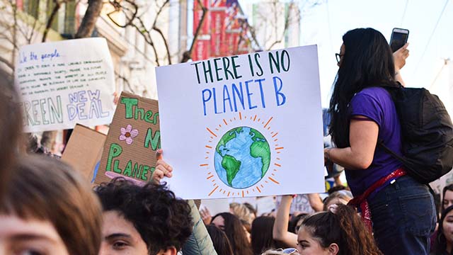 protestors with signs