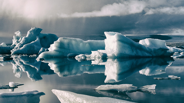 icebergs floating in the sea