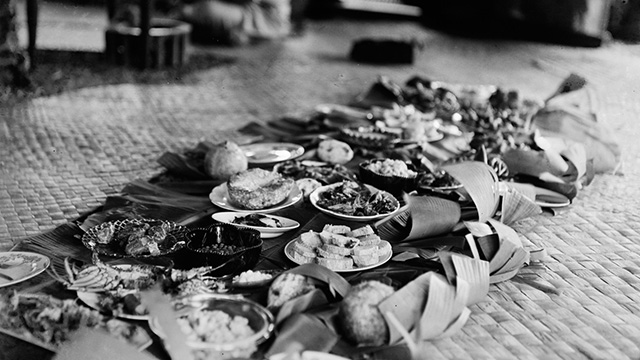 Plates of food on flax mats
