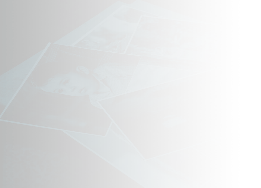 Photographs spread out on a table