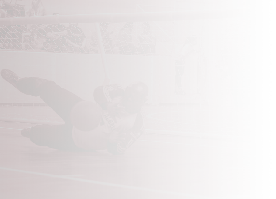 player reaching for the goalball