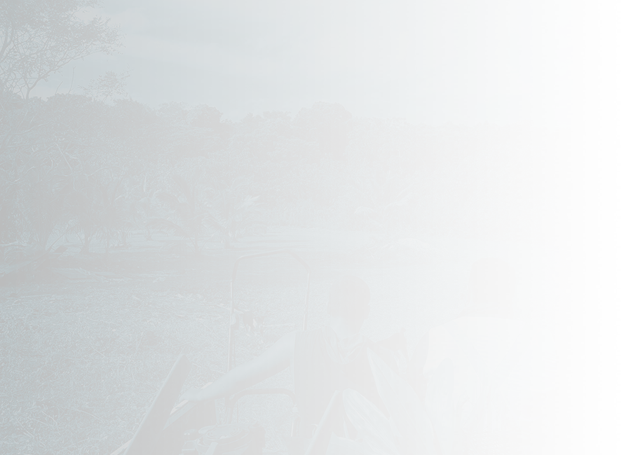 two people sitting in the back of a vehicle