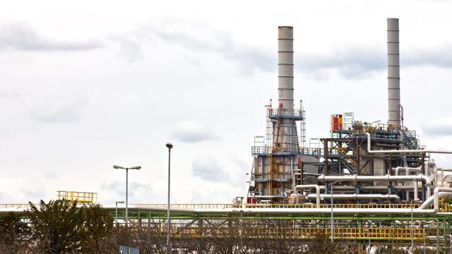 The smoke stacks of a chemical refinery 