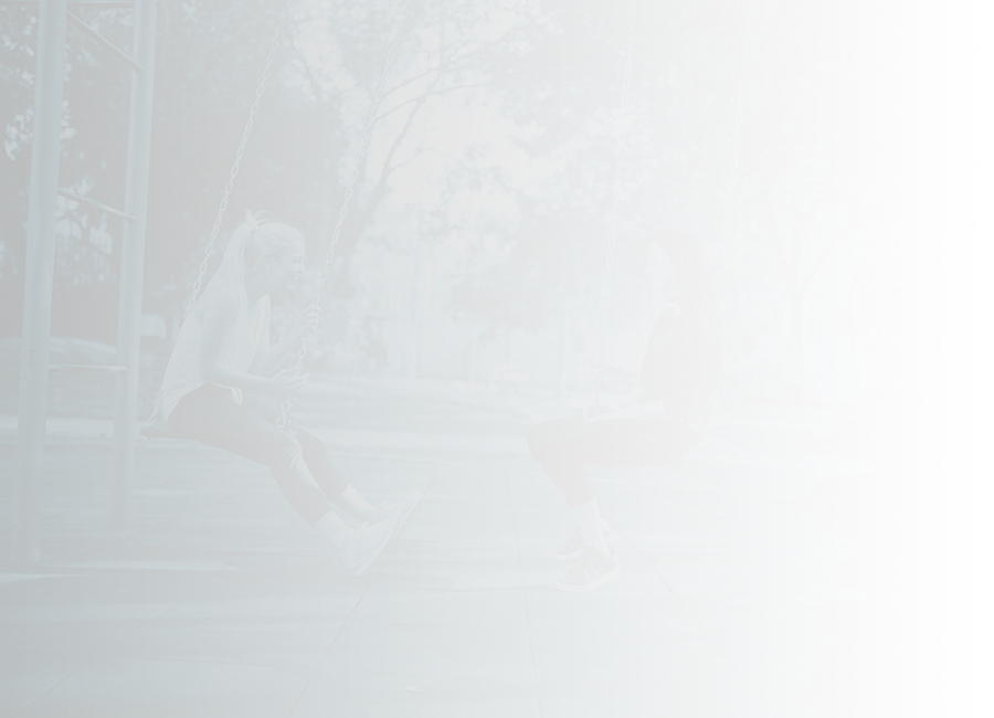 two people on swings