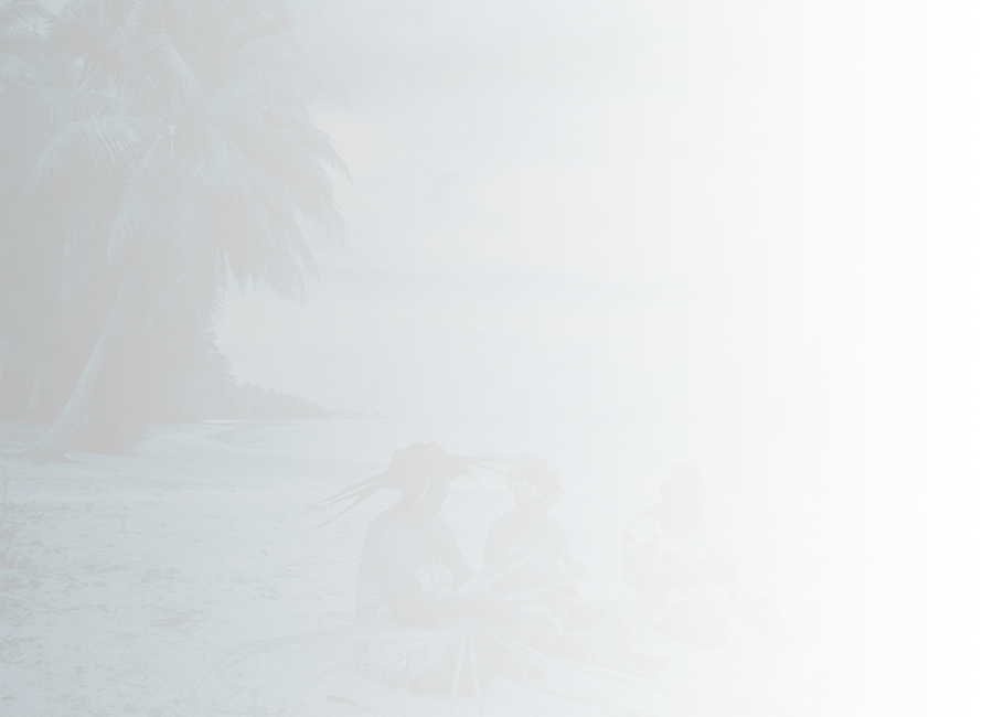 women sitting on a beach in Cook Islands