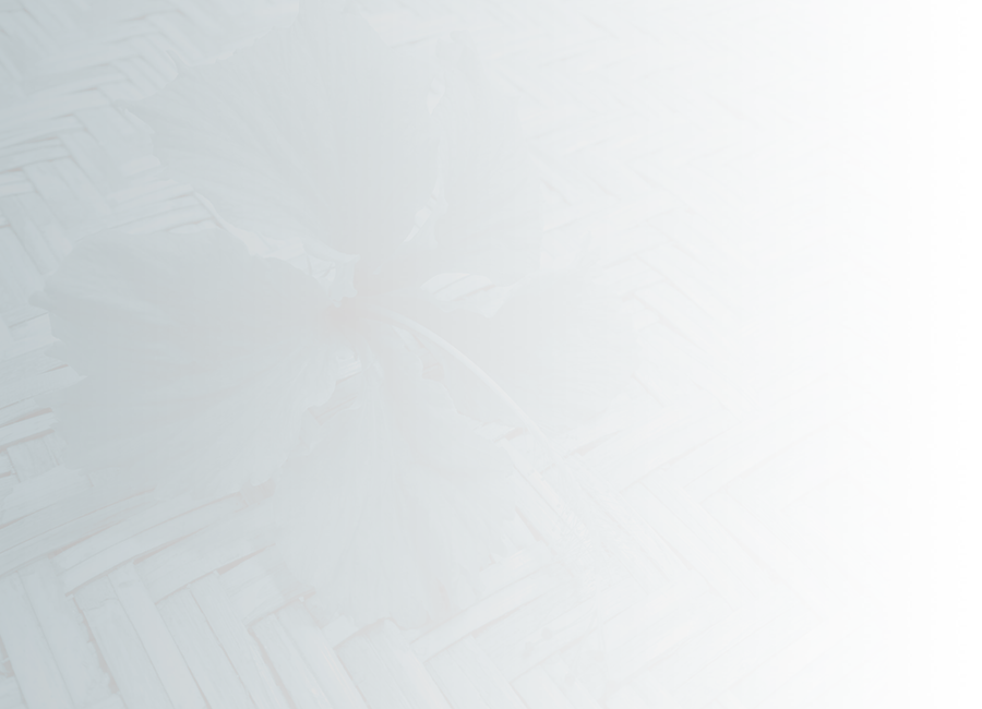 red flower on a woven mat