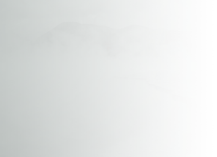 steam rising from geothermal lake