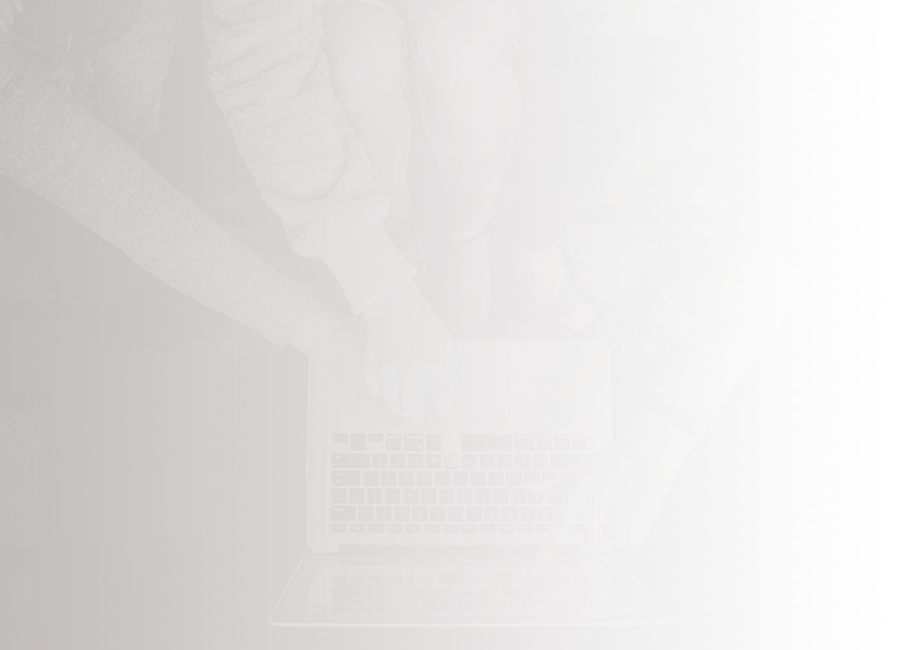 young people pointing at a laptop screen