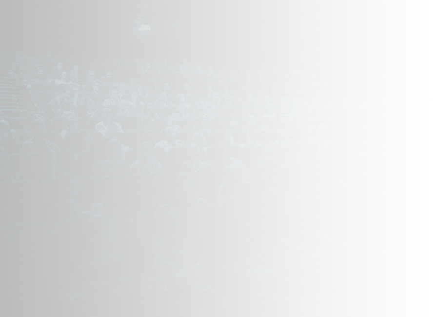 People sitting in movie theatre
