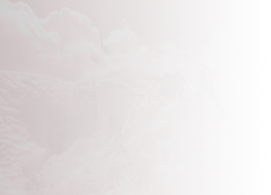 team of climbers walking up a glacier