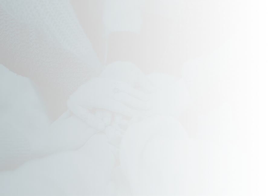 group of friends with hands together in a circle