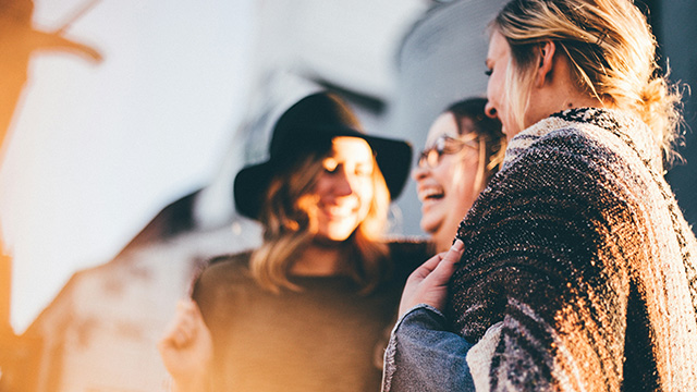 people laughing and talking