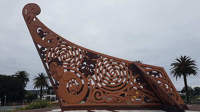 carved sculpture in the shape of a tauihu