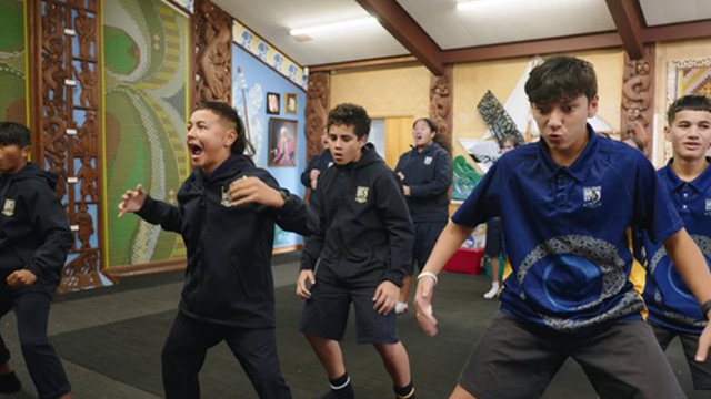 students performing a haka